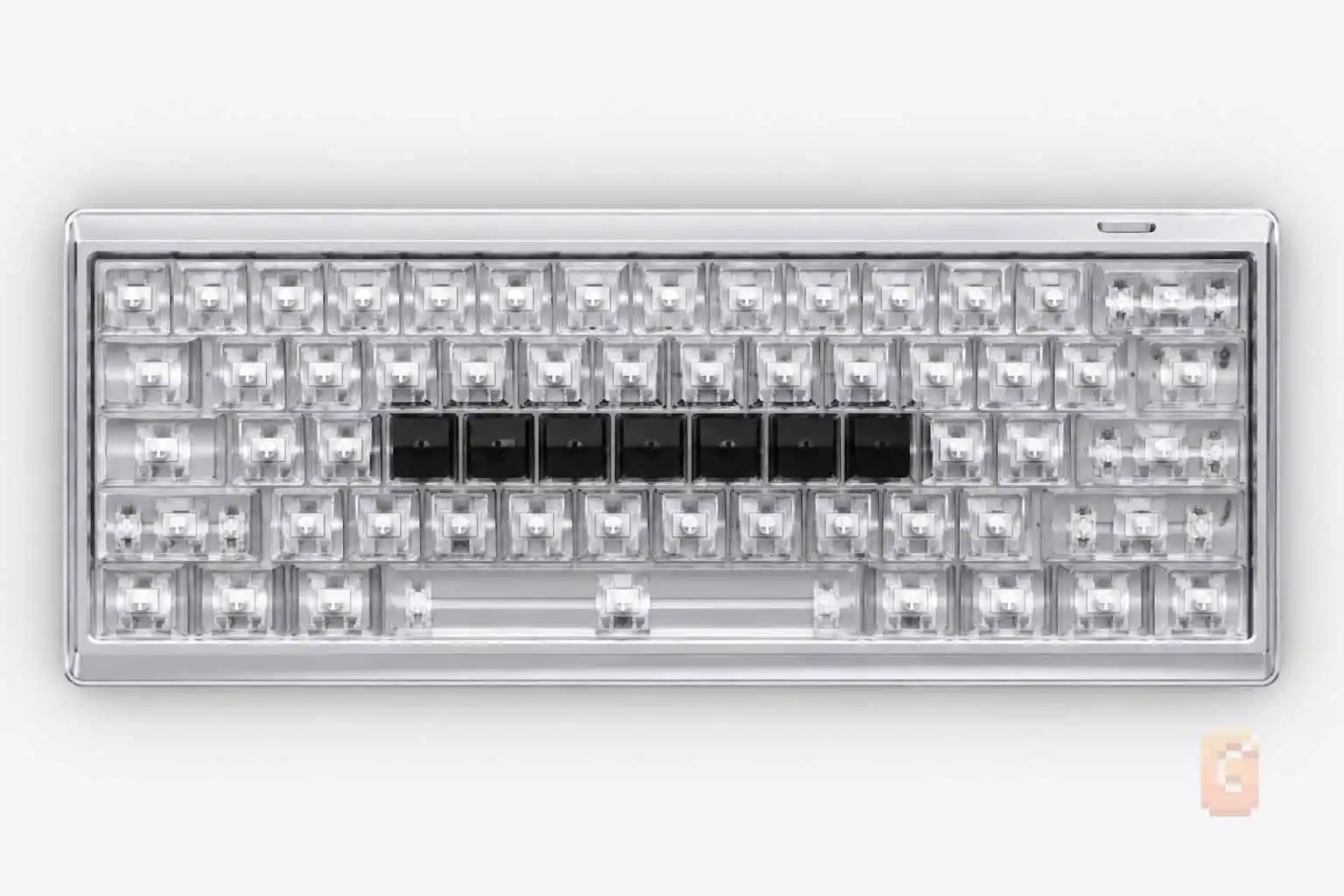 ATK Velota Fuzzy 60 V2 keyboard with keycaps removed showing Silver Regent King magnetic switches